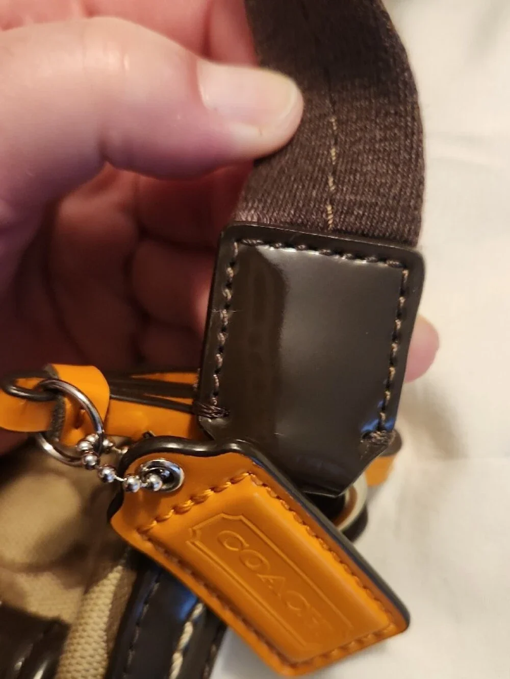 brown Coach Signature Jacquard crossbody bag